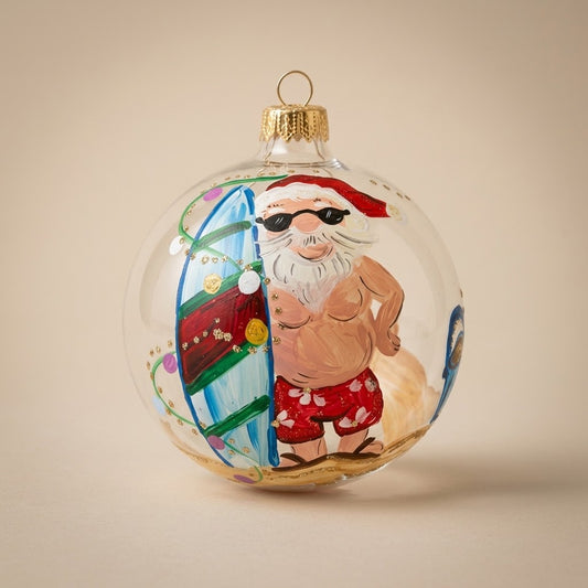 Palla di Natale Ø 10 cm dipinta a mano: Babbo Natale surfista su vetro trasparente