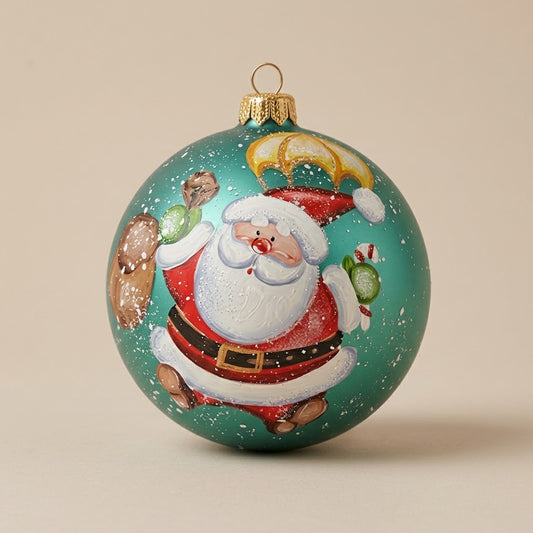 Palla di Natale Ø 12 cm dipinta a mano: Babbo Natale col paracadute su turchese