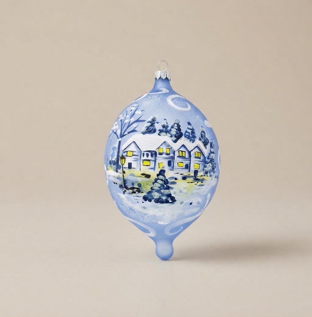 Light blue Christmas teardrop ornament with snowy village and moon, hand-painted