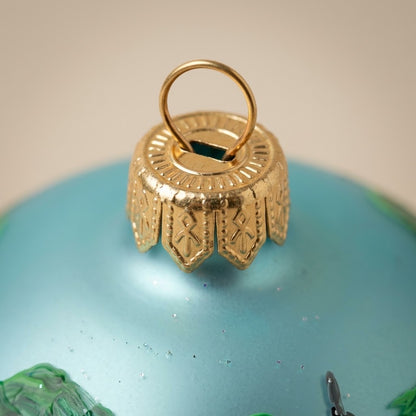 Lato e retro della palla di Natale in vetro soffiato