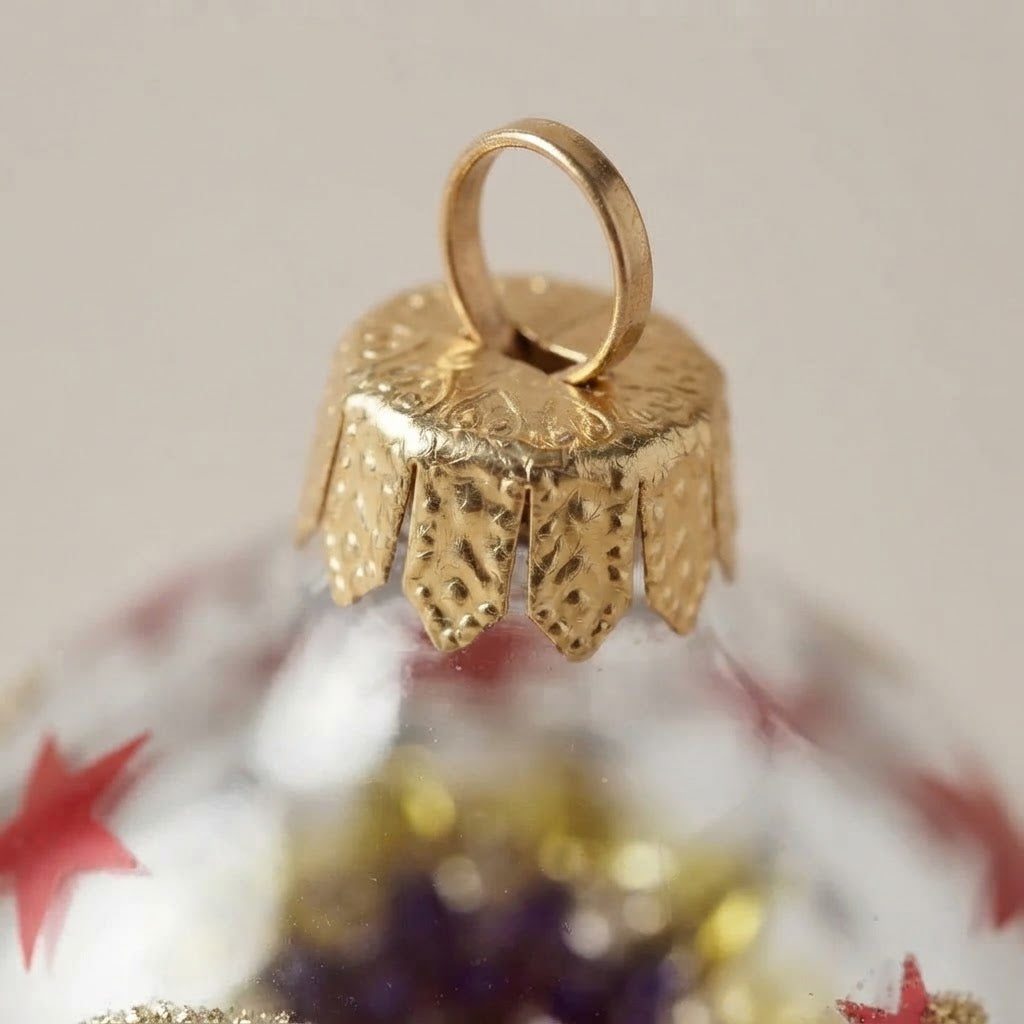 Lato e retro dell'ovale di Natale in vetro soffiato