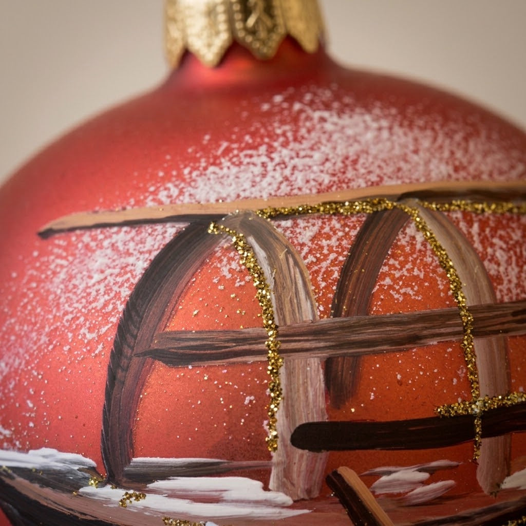 Lato e retro della palla di Natale in vetro soffiato