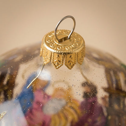 Lato e retro della palla di Natale in vetro soffiato