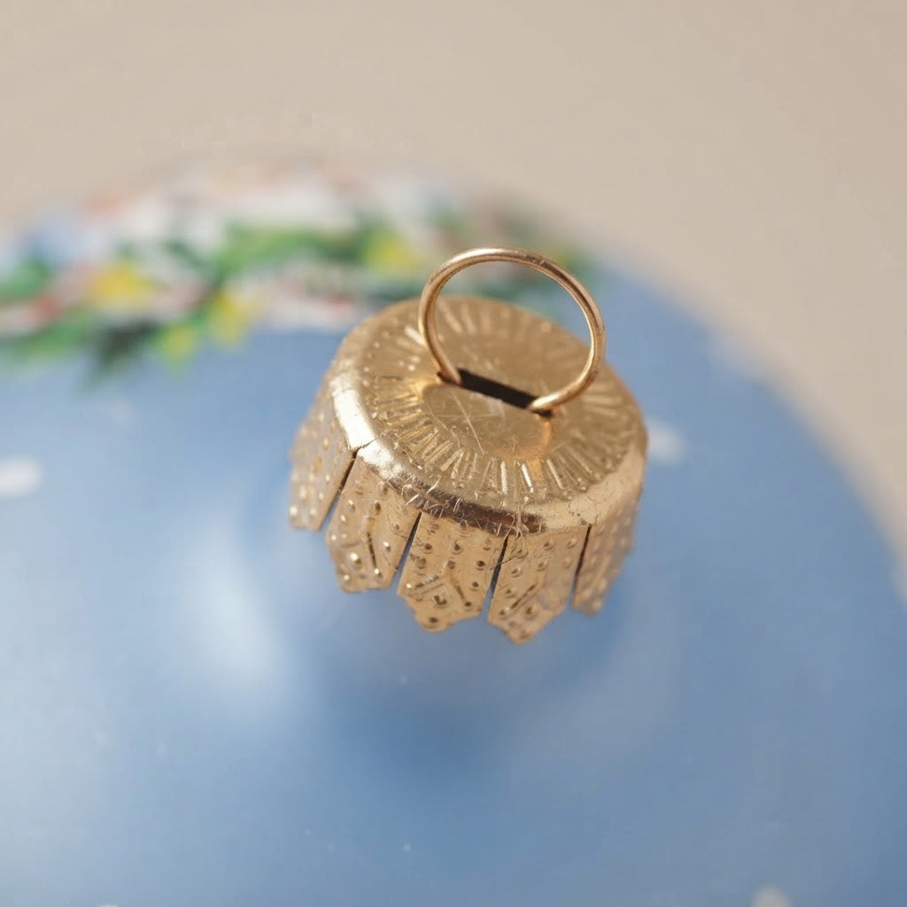 Lato e retro della palla di Natale in vetro soffiato