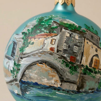 Lato e retro della palla di Natale in vetro soffiato