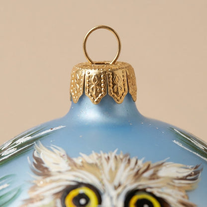 Lato e retro della palla di Natale in vetro soffiato