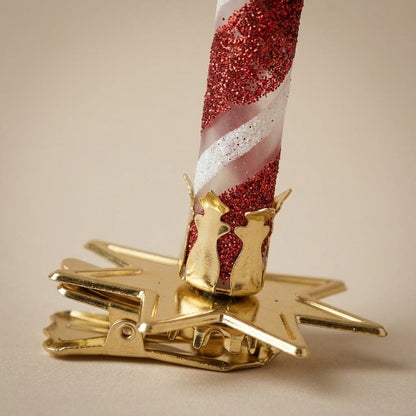 Detail of the gold clip of the glass candle ornament