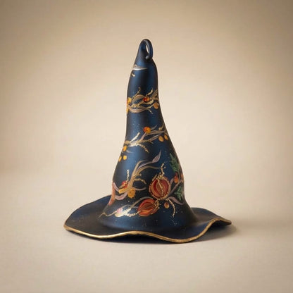 Black witch hat with pumpkins, leaves and gold glitter