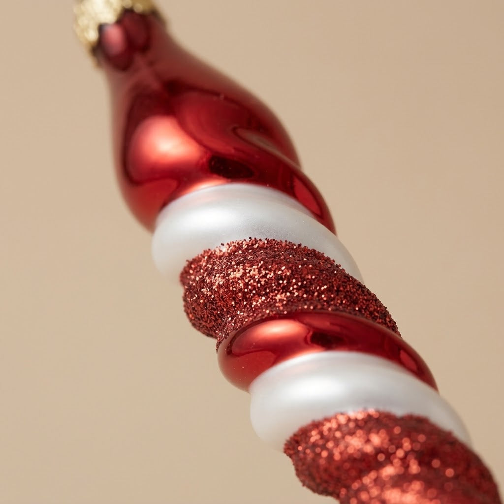 Detail of the red, white and glitter spiral on the mouth-blown glass icicle