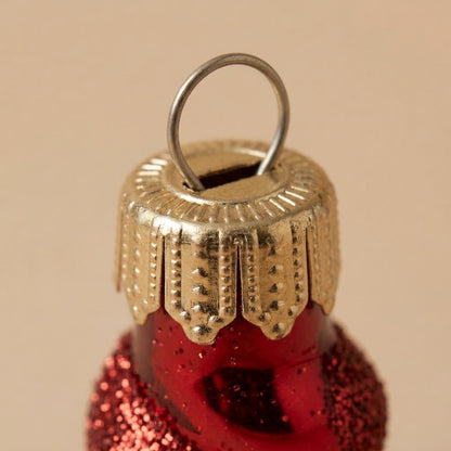 Gold cap of the red and white glass icicle ornament