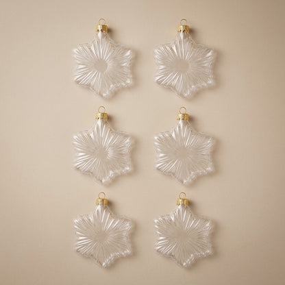Set of 6 clear glass star ornaments with gold caps