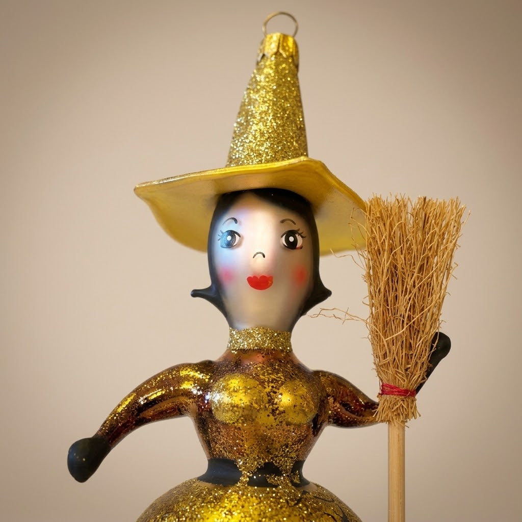 Hand-painted face of the gold witch with glitter hat