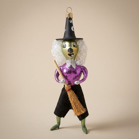 Strega di Halloween in vetro con maglia viola, capelli ricci e scopa