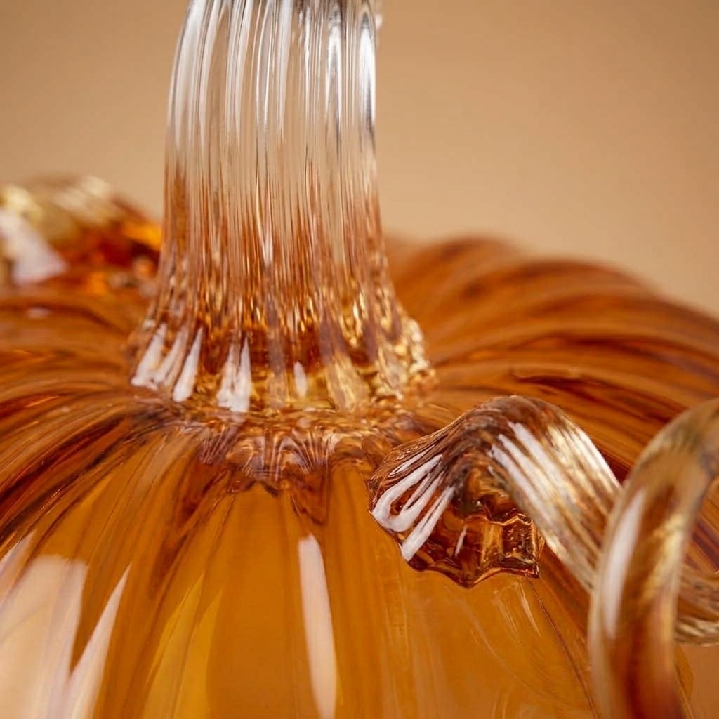 Ribbed stem of the amber glass pumpkin