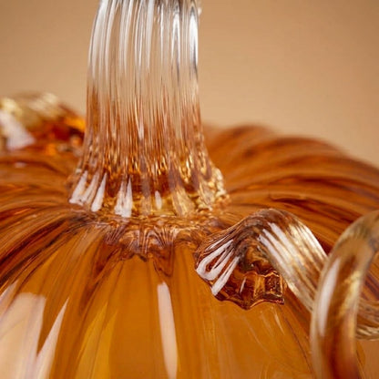 Ribbed stem of the amber glass pumpkin